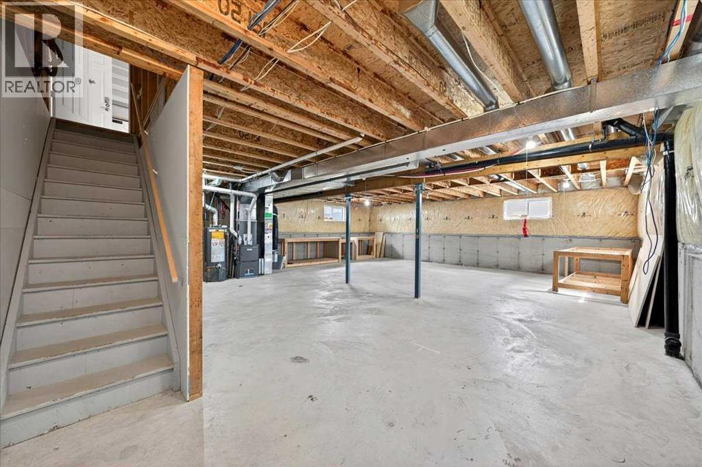 18 Cougarstone Bay SW, Calgary, Alberta  T3H 4Z4 - Photo 39 - A2327235
