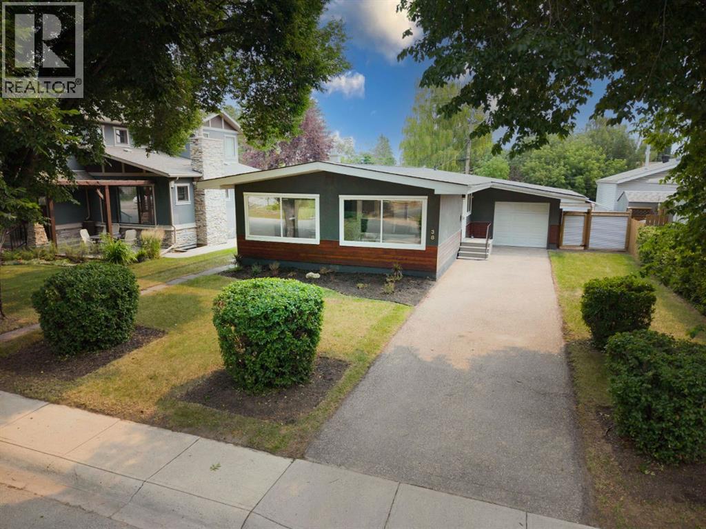 38 Westwood Drive SW, Calgary, Alberta  T3C 2V7 - Photo 1 - A2331864