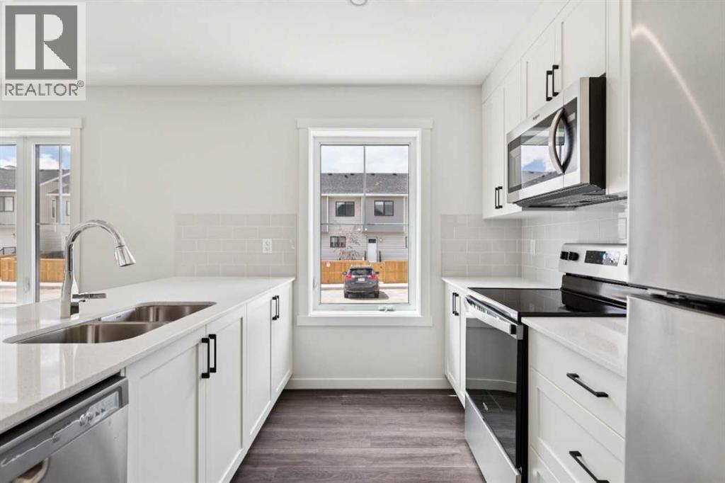 202, 40 Livingston Parade NE, Calgary, Alberta T4B 3P6 - Photo 5 - A2337615