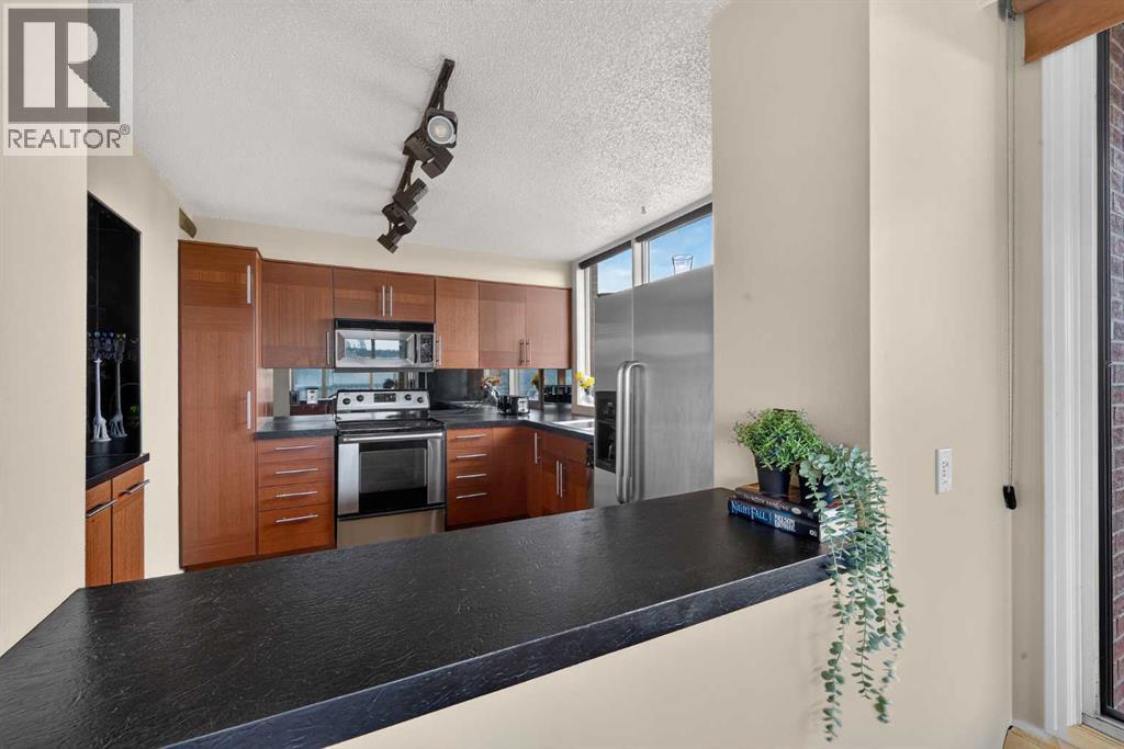 1607, 145 Point Drive Nw, Calgary, Alberta T3B 4W1 - Photo 10 - A2329985