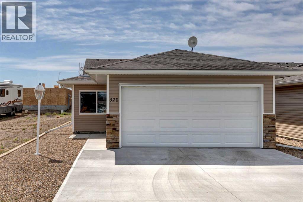 320 Whispering Way, Vulcan, Alberta  T0L 2B0 - Photo 2 - A2331029