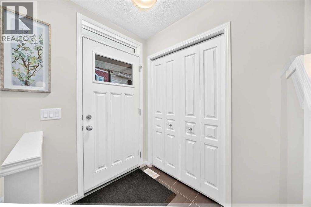203 Auburn Meadows Walk Se, Calgary, Alberta T3M 2E7 - Photo 4 - A2318882