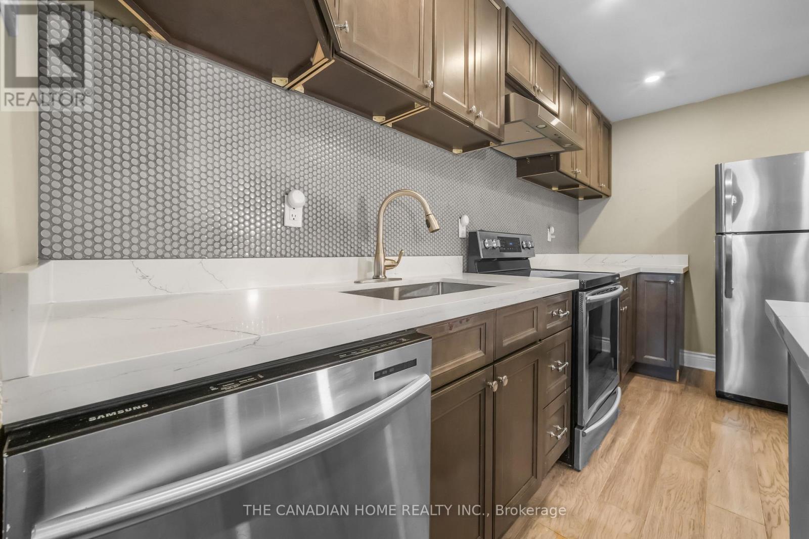 103 - 4 Lisa Street, Brampton (Queen Street Corridor), Ontario  L6T 4B6 - Photo 2 - W13678478