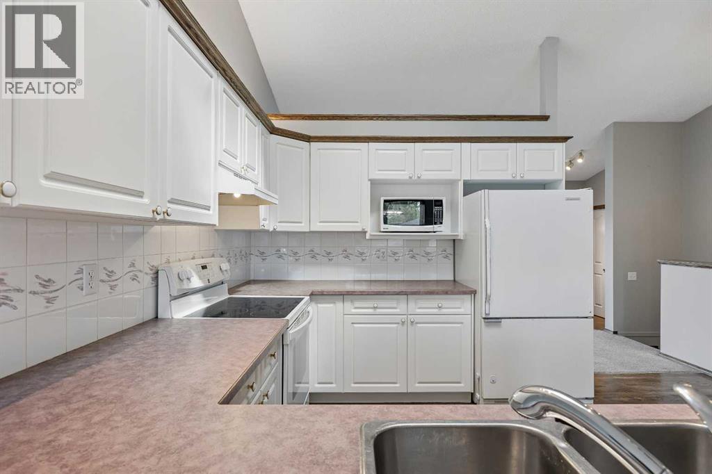 121 Quigley Drive, Cochrane, Alberta  T4C 1R1 - Photo 15 - A2317758