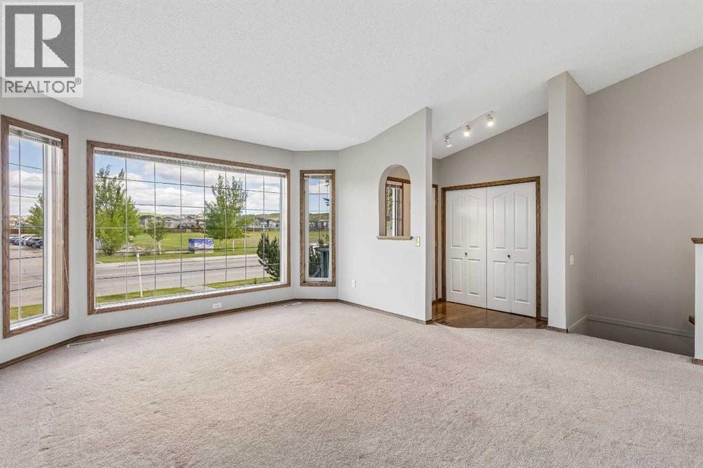 121 Quigley Drive, Cochrane, Alberta  T4C 1R1 - Photo 7 - A2317758