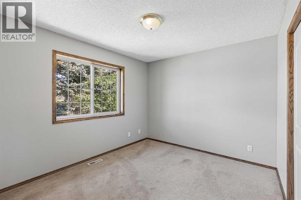 121 Quigley Drive, Cochrane, Alberta  T4C 1R1 - Photo 25 - A2317758