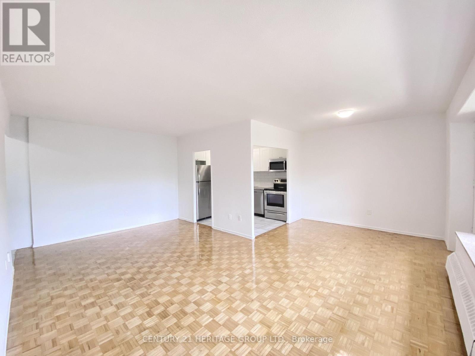 206 - 10 Garfella Drive, Toronto (Mount Olive-Silverstone-Jamestown), Ontario  M9V 2E9 - Photo 4 - W13678536