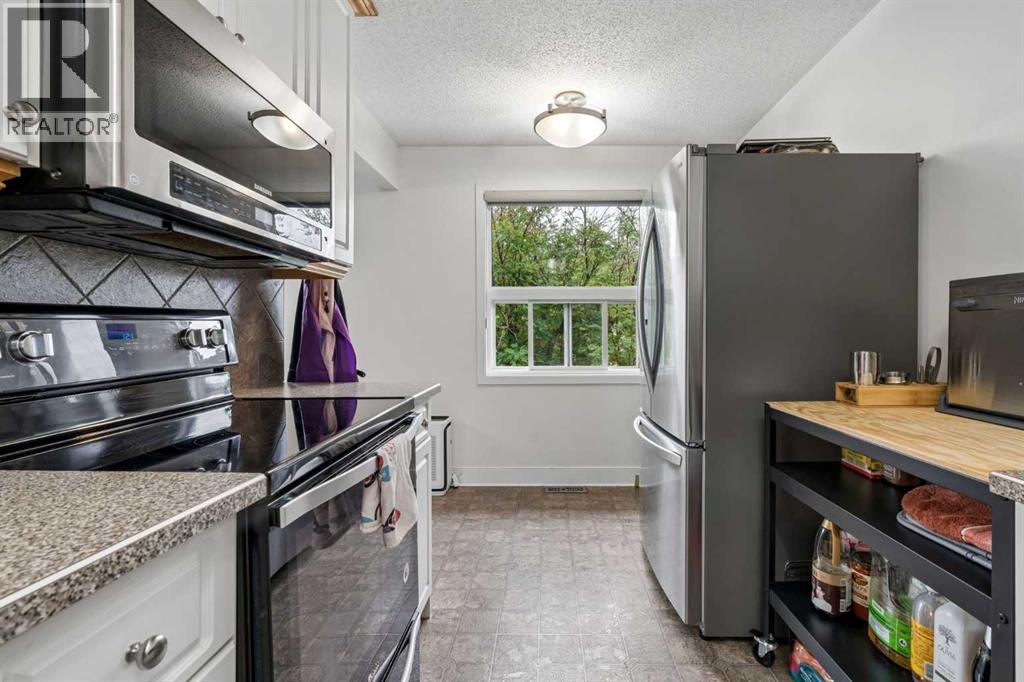 25, 1011 Canterbury Drive SW, Calgary, Alberta T2W 2S8 - Photo 12 - A2336989