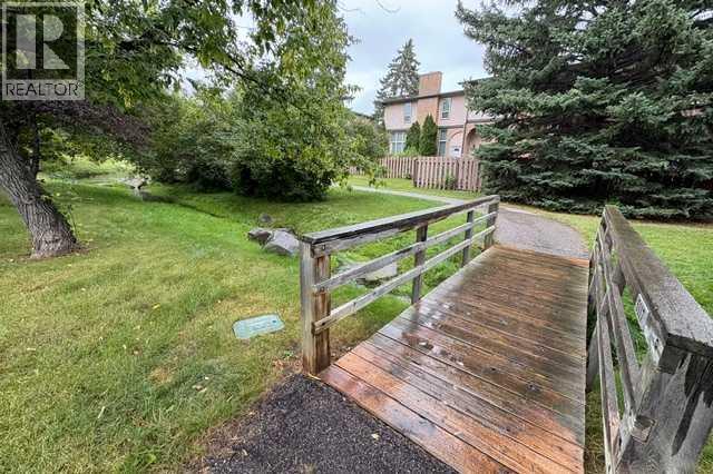 25, 1011 Canterbury Drive SW, Calgary, Alberta T2W 2S8 - Photo 2 - A2336989