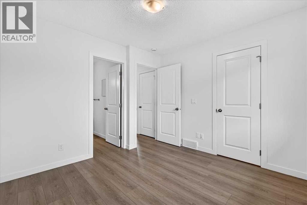 134 New Brighton Landing SE, Calgary, Alberta  T2Z 1C1 - Photo 30 - A2335865