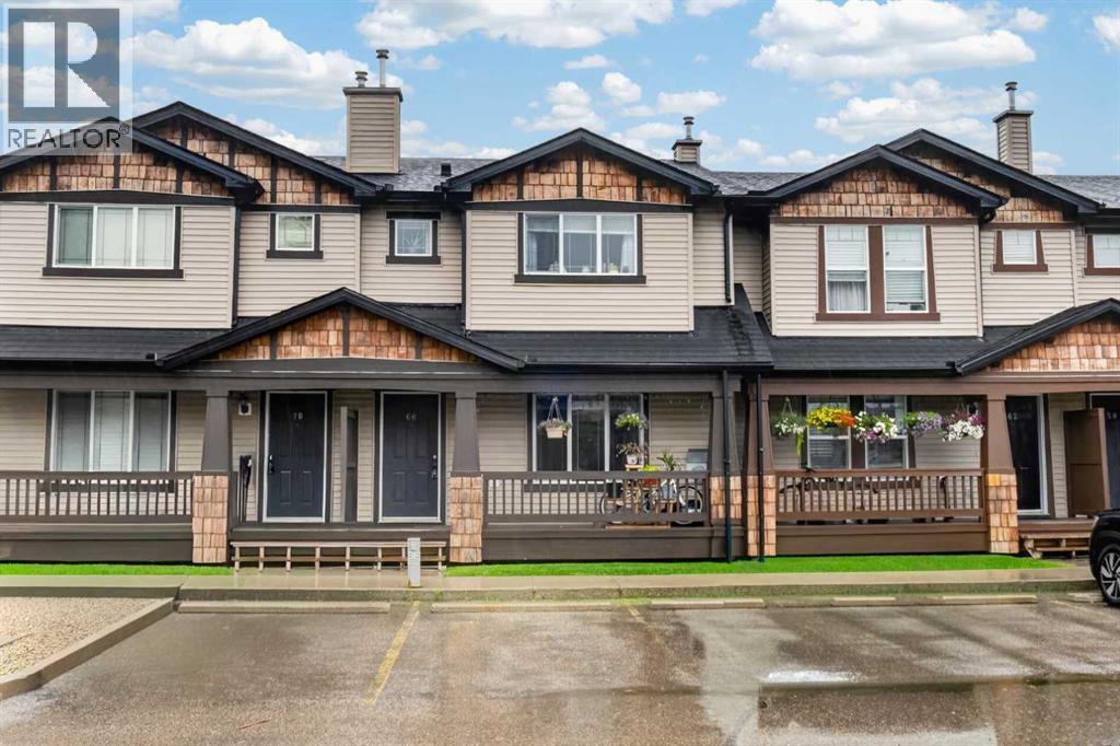 66 Panatella Park NW, Calgary, Alberta  T3K 6K4 - Photo 1 - A2337505