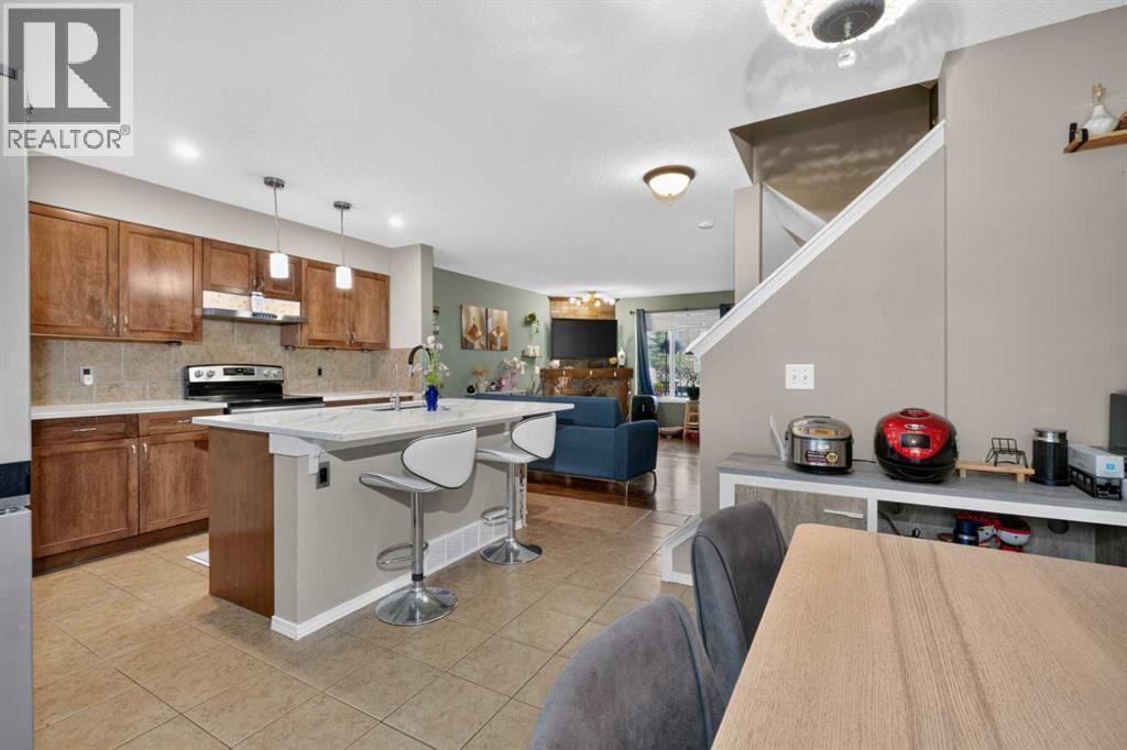 66 Panatella Park NW, Calgary, Alberta  T3K 6K4 - Photo 3 - A2337505