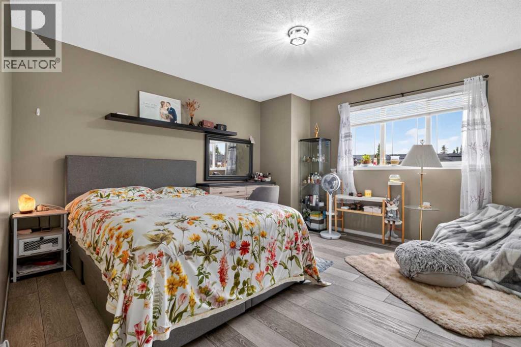 66 Panatella Park NW, Calgary, Alberta  T3K 6K4 - Photo 26 - A2337505