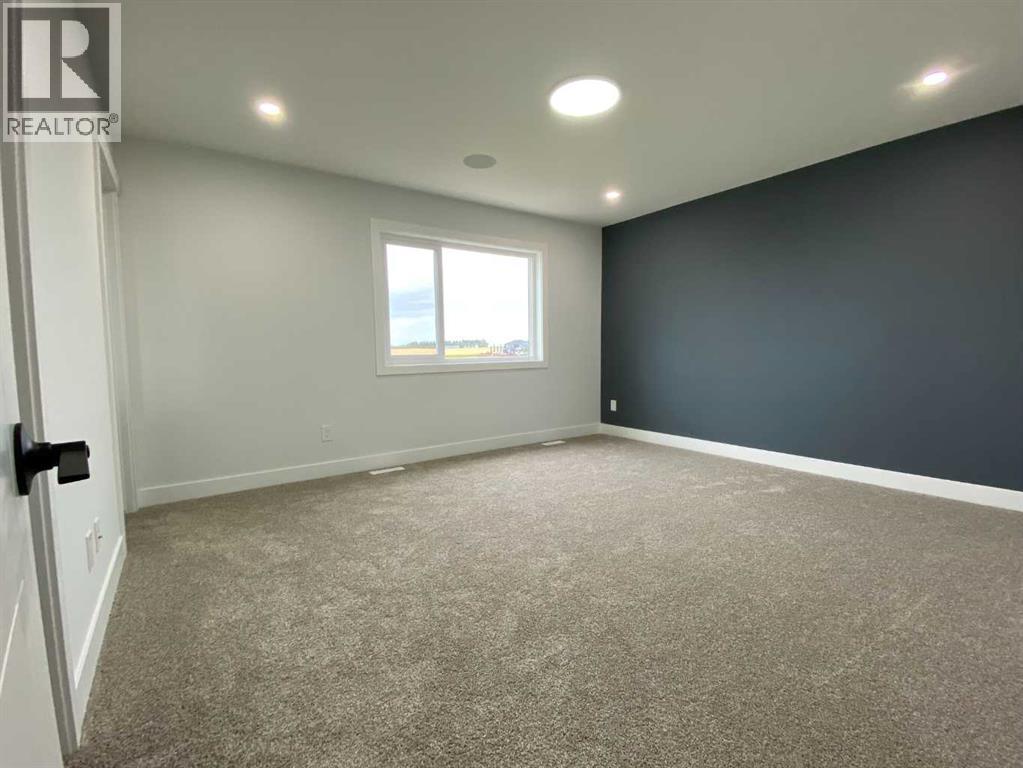1409 Aldrich Place SW, Carstairs, Alberta  T0M 0N0 - Photo 26 - A2337436
