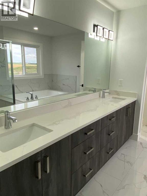 1409 Aldrich Place SW, Carstairs, Alberta  T0M 0N0 - Photo 20 - A2337436