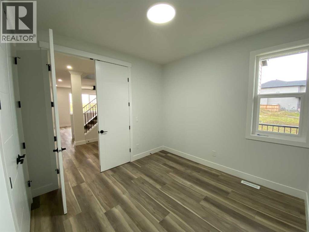 1409 Aldrich Place SW, Carstairs, Alberta  T0M 0N0 - Photo 12 - A2337436