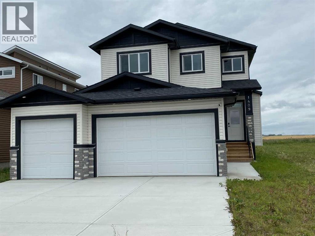 1409 Aldrich Place SW, Carstairs, Alberta  T0M 0N0 - Photo 2 - A2337436