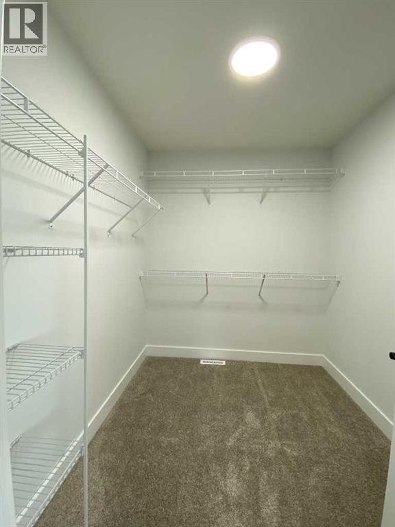 1409 Aldrich Place SW, Carstairs, Alberta  T0M 0N0 - Photo 25 - A2337436
