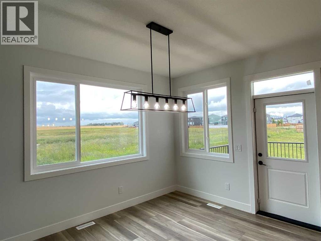 1409 Aldrich Place SW, Carstairs, Alberta  T0M 0N0 - Photo 9 - A2337436
