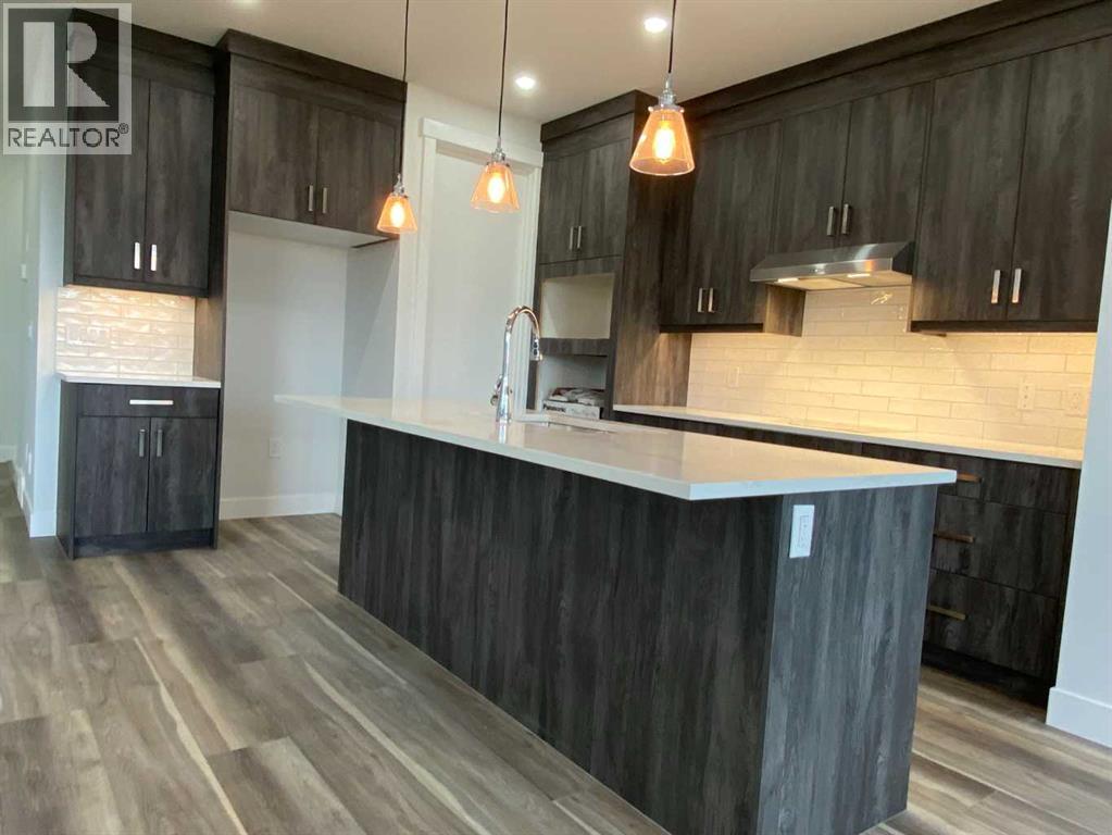 1409 Aldrich Place SW, Carstairs, Alberta  T0M 0N0 - Photo 7 - A2337436