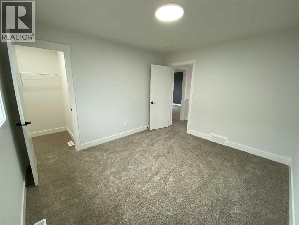 1409 Aldrich Place SW, Carstairs, Alberta  T0M 0N0 - Photo 17 - A2337436