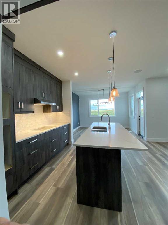 1409 Aldrich Place SW, Carstairs, Alberta  T0M 0N0 - Photo 4 - A2337436