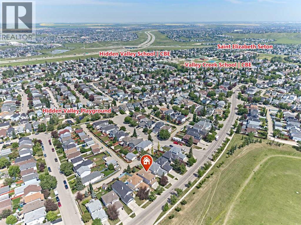 9683 Hidden Valley Drive Nw, Calgary, Alberta  T3A 5P8 - Photo 2 - A2327578