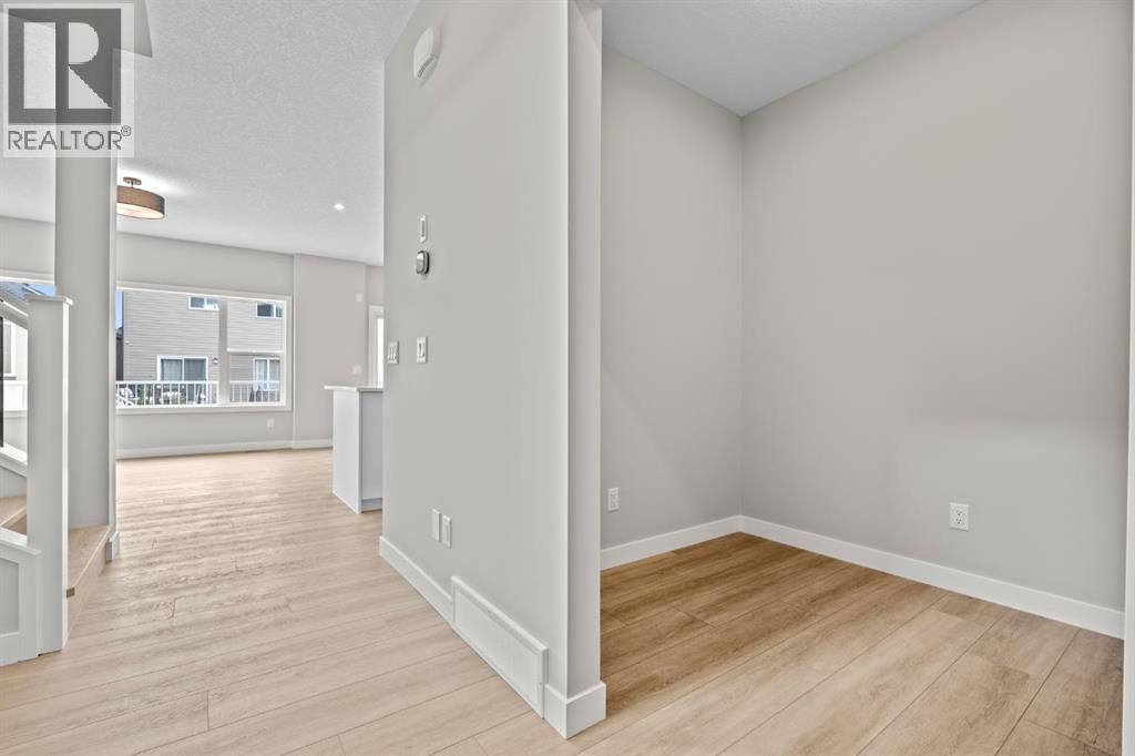 129 Walgrove Bay SE, Calgary, Alberta  T2X 4Y7 - Photo 4 - A2324906