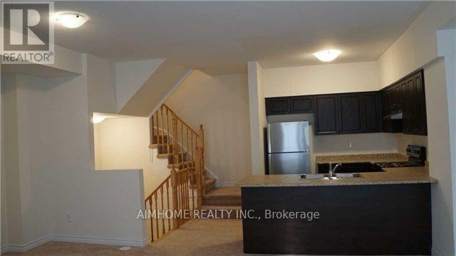 13 - 1251 Bridletowne Circle, Toronto, Ontario  M1W 0A5 - Photo 2 - E13679010