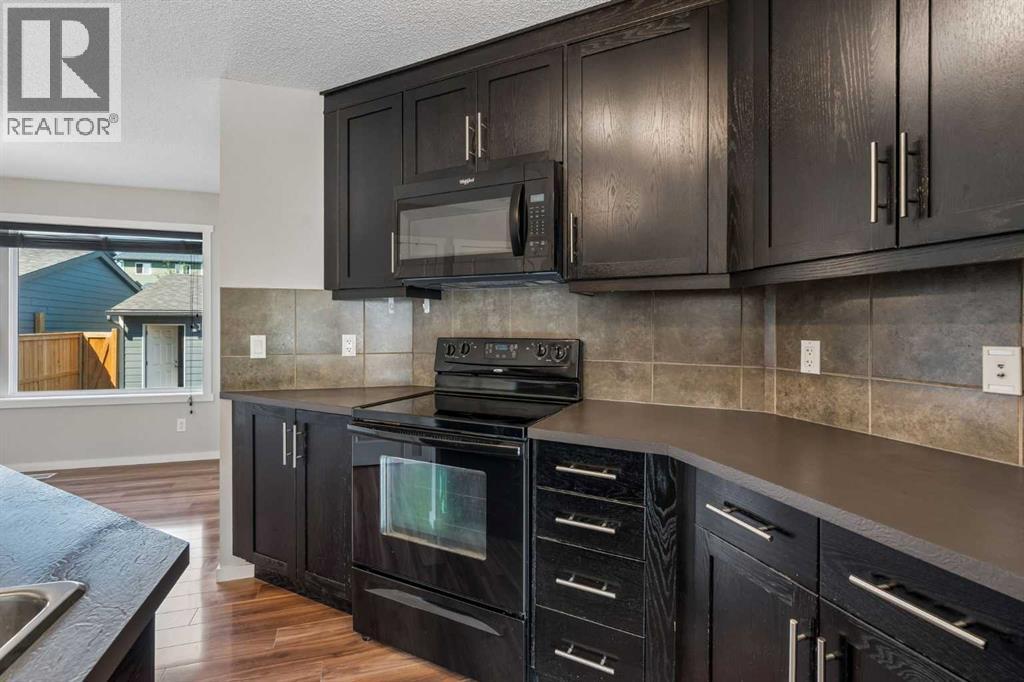 175 Panamount Way NW, Calgary, Alberta  T3K 0S8 - Photo 9 - A2333602