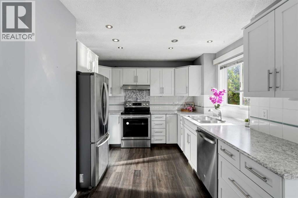 175 Shannon Circle SW, Calgary, Alberta  T2Y 2L1 - Photo 6 - A2326498