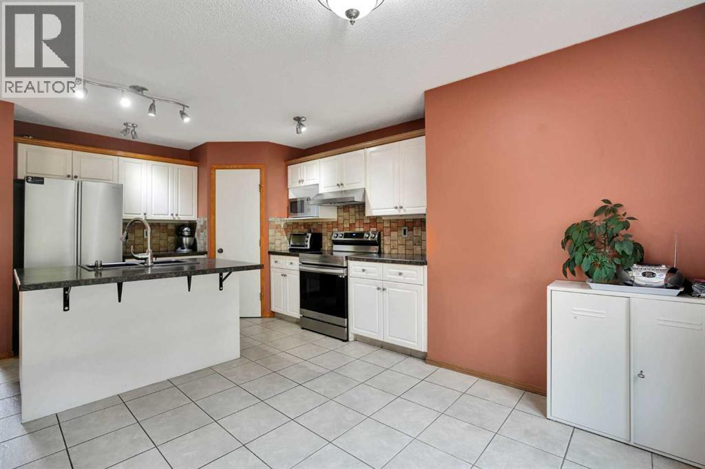 332 Harvest Hills Drive Ne, Calgary, Alberta T3K 4H7 - Photo 9 - A2332433