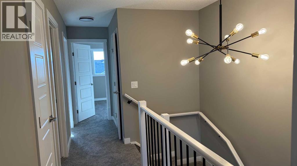 16 Sundown Place, Cochrane, Alberta  T4C 3H2 - Photo 22 - A2269276