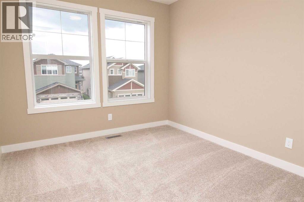115 Sundown Crescent, Cochrane, Alberta  T4C 1Y3 - Photo 15 - A2297377