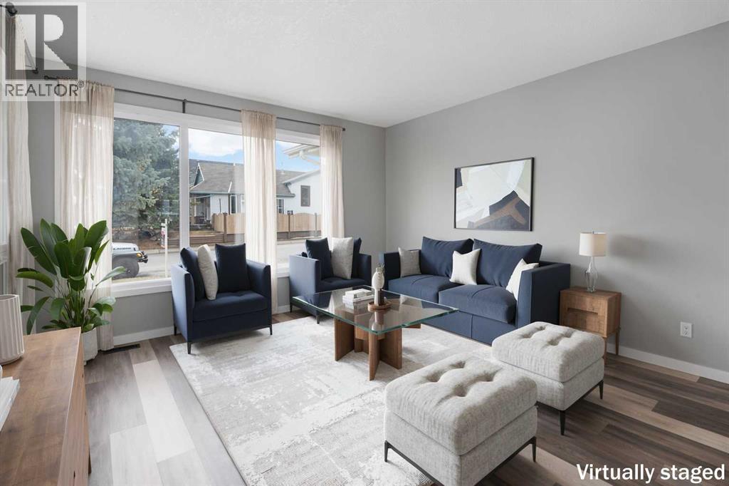 51 Woodmont Road SW, Calgary, Alberta  T2W 4L6 - Photo 7 - A2324229