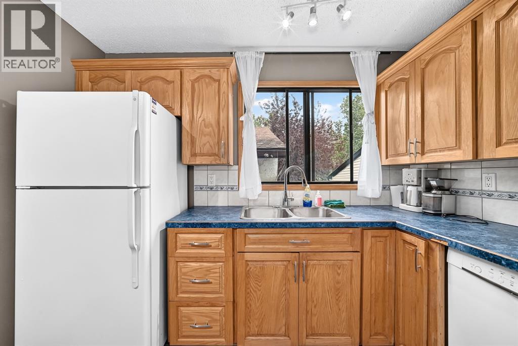 961 Ranchview Crescent Nw, Calgary, Alberta  T3G 1A4 - Photo 6 - A2331907