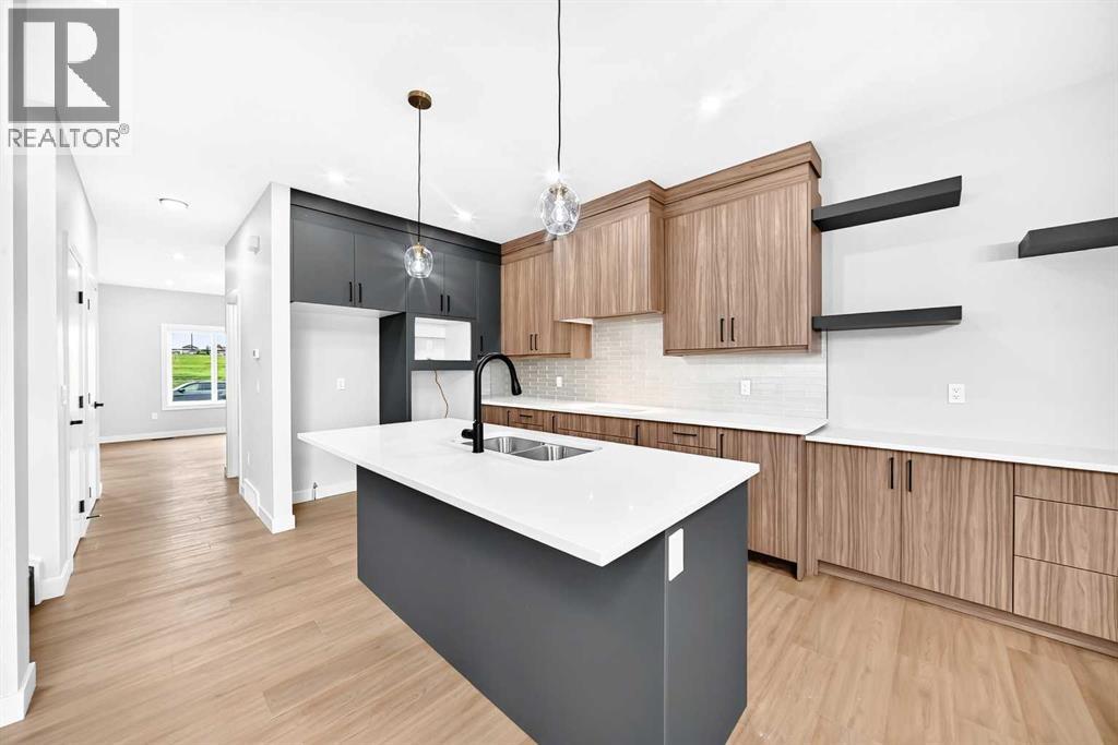 1915 Mccaskill Drive, Crossfield, Alberta  T0M 0S0 - Photo 11 - A2337394