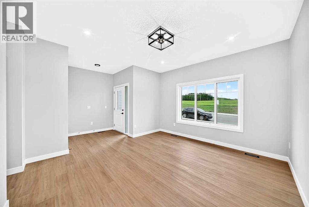 1915 Mccaskill Drive, Crossfield, Alberta  T0M 0S0 - Photo 5 - A2337394