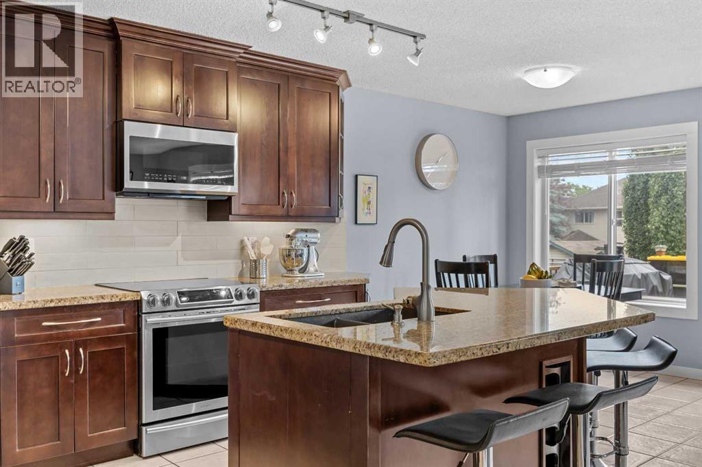 109 Hidden Valley Grove Nw, Calgary, Alberta  T3A 5W8 - Photo 5 - A2329265