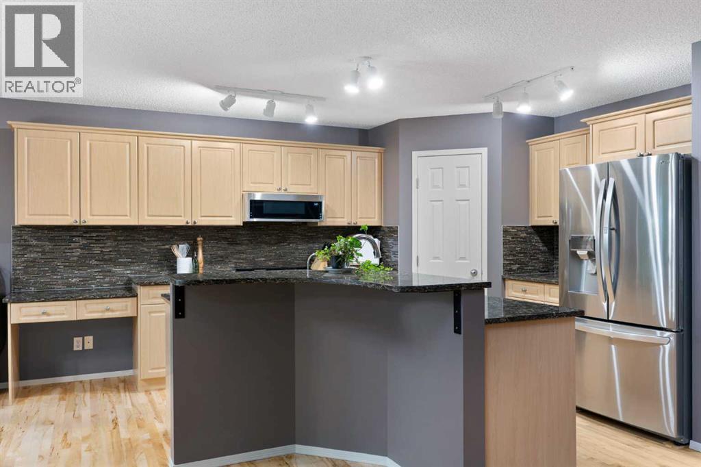 131 Valley Stream Close NW, Calgary, Alberta  T3B 5V7 - Photo 18 - A2337160