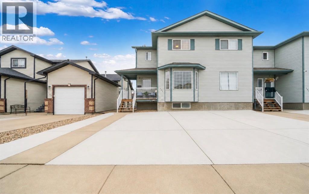 719 Sprague Way SE, Medicine Hat, Alberta  T1B 4L4 - Photo 1 - A2336554