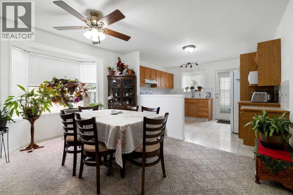 100 Dovista Court Se, Calgary, Alberta T2B 3P4 - Photo 11 - A2337638