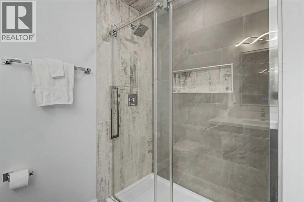 61 Wood Valley Road SW, Calgary, Alberta  T2W 5Y6 - Photo 25 - A2336262