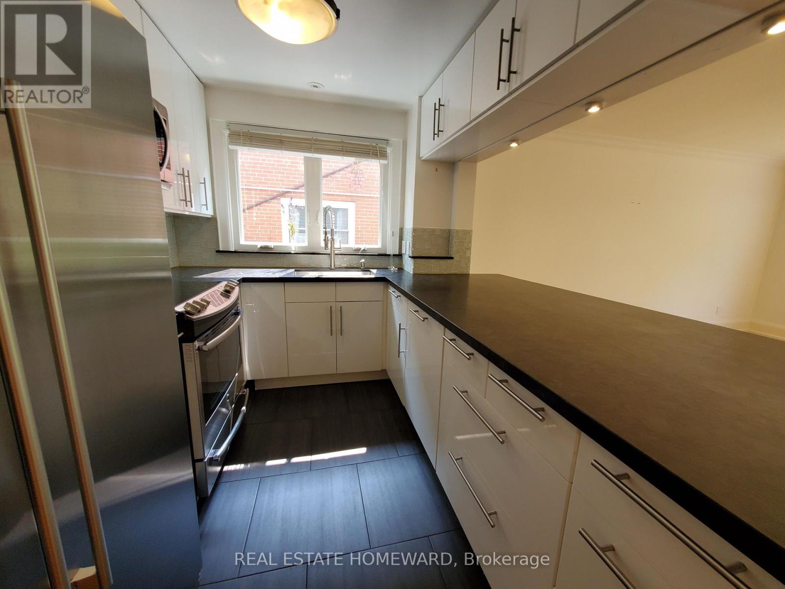 Main Floor - 21 Love Crescent, Toronto, Ontario  M4E 1V6 - Photo 11 - E13498058