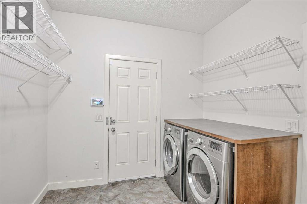 204 Eversyde Mews SW, Calgary, Alberta  T2Y 5A4 - Photo 7 - A2337730