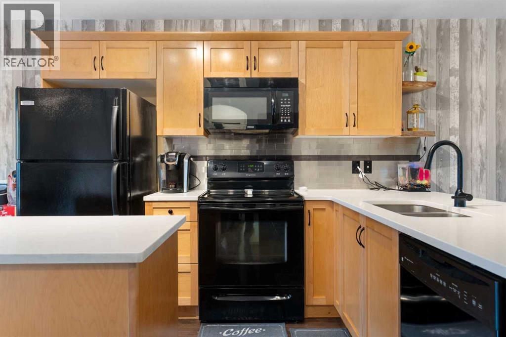 153 Rainbow Falls Manor W, Chestermere, Alberta T1X 0M3 - Photo 8 - A2337231