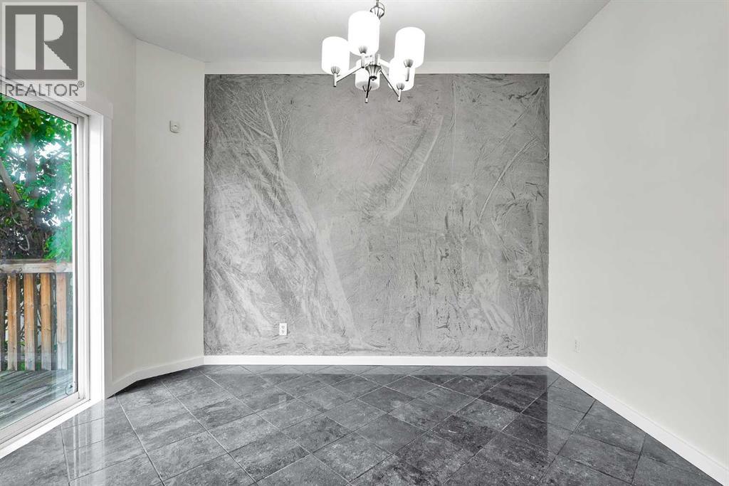 7097 Laguna Way NE, Calgary, Alberta  T1Y 7A7 - Photo 11 - A2337713