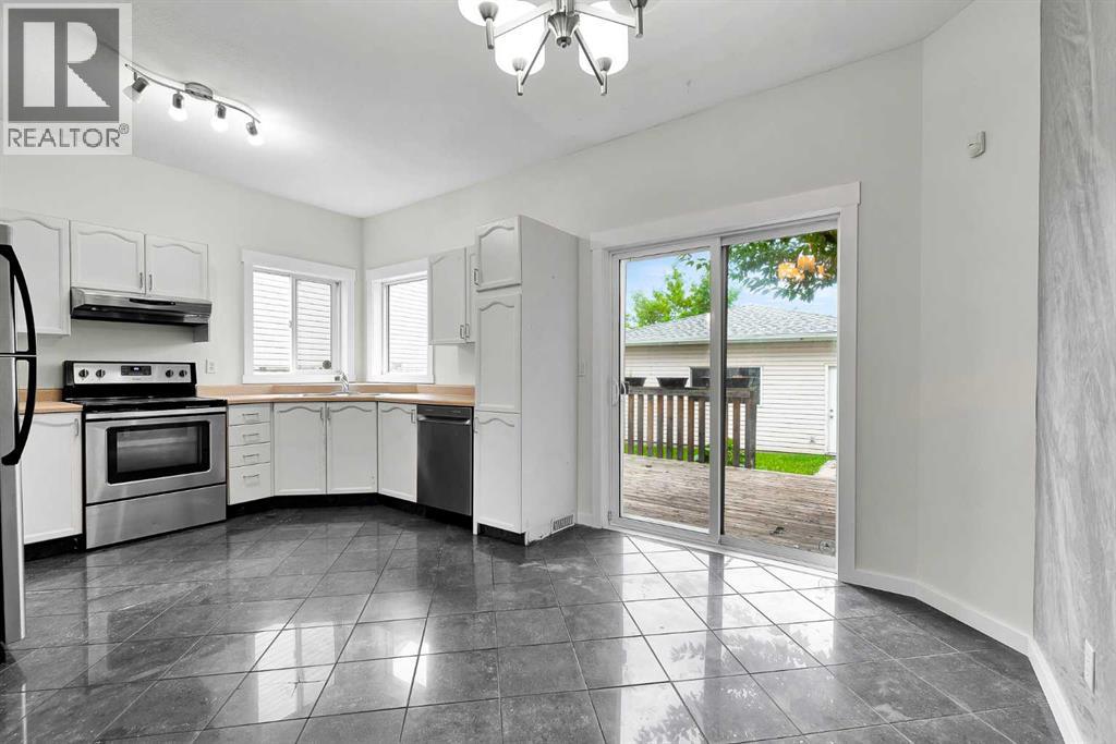 7097 Laguna Way NE, Calgary, Alberta  T1Y 7A7 - Photo 12 - A2337713