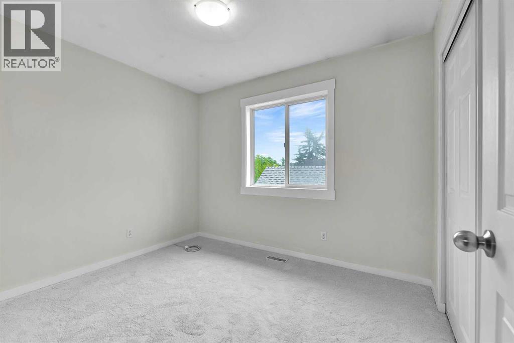 7097 Laguna Way NE, Calgary, Alberta  T1Y 7A7 - Photo 18 - A2337713