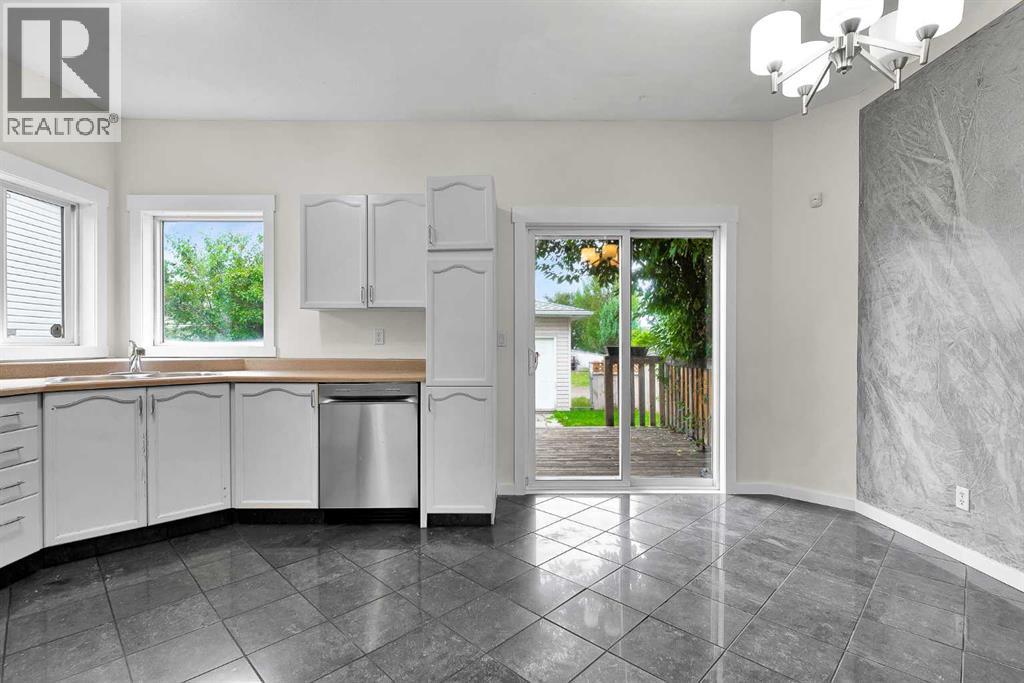 7097 Laguna Way NE, Calgary, Alberta  T1Y 7A7 - Photo 9 - A2337713